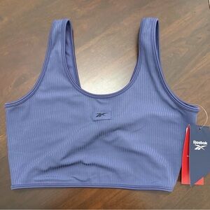 Reebok Sports Bra Women’s blue size medium twist back bralette unlined